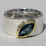 Art.-Nr. Ca- RS1607TL Silberring teilvergoldet mit Topas london blue | Mathilda, 10x5mm fac, 149,00€