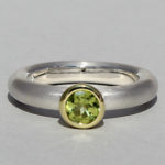 Art.-Nr. Ca-RS1602P Silberring teilvergoldet mit Peridot | Strack round 5 mm fac. Peridot, 114,00€